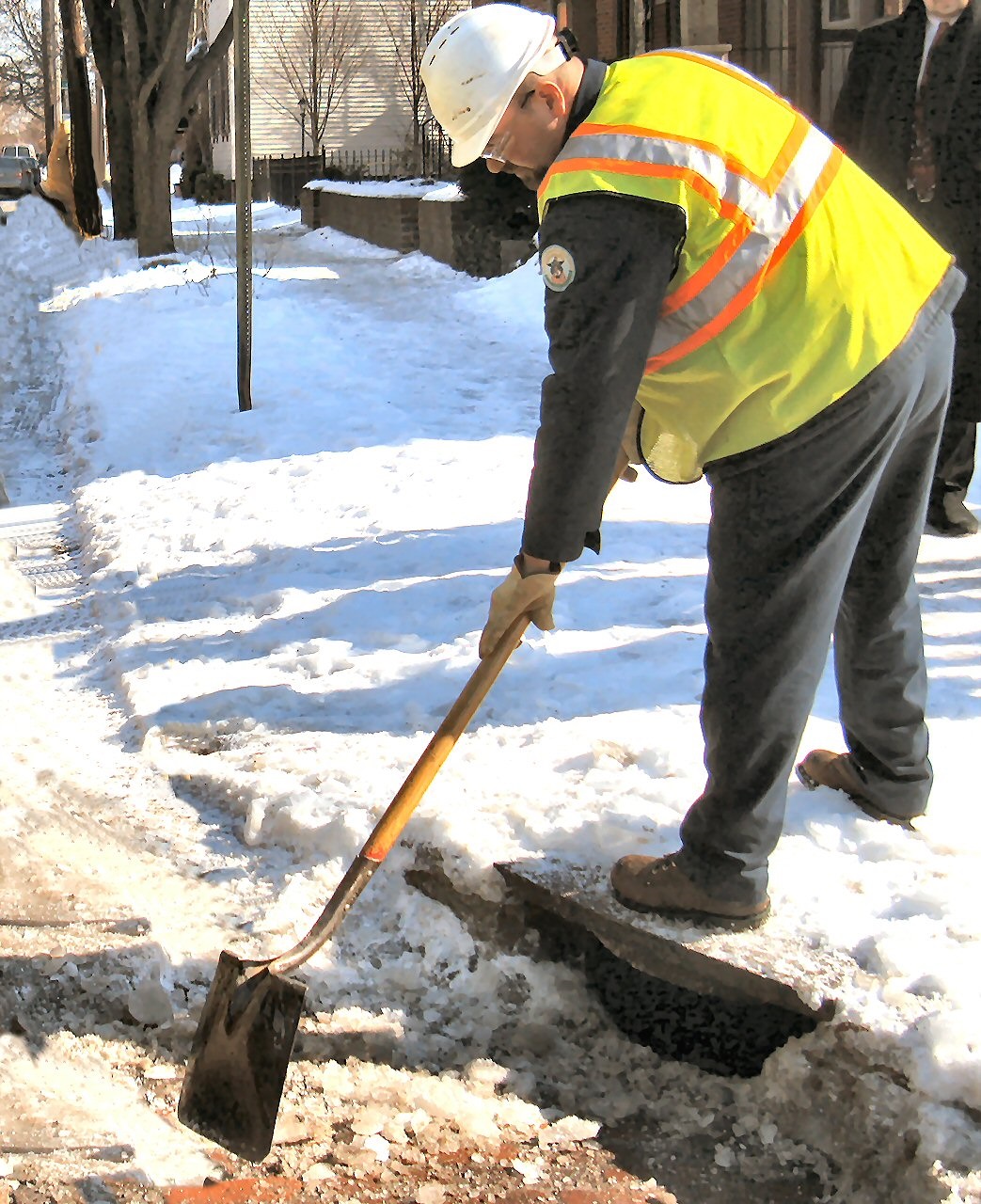 Construction Worker in Vest Digging